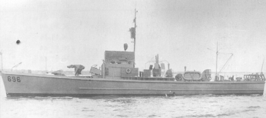 USS SC-696, a WWII US Navy submarine chaser of the SC-497 class, photographed at sea in Navy service.